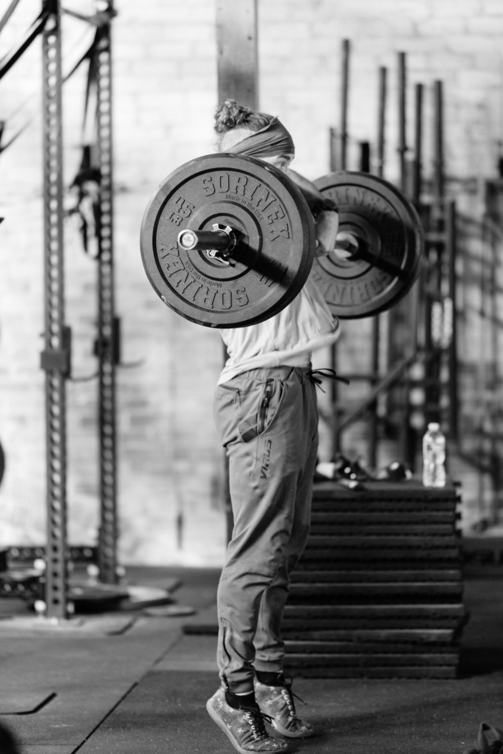A person lifting a barbell